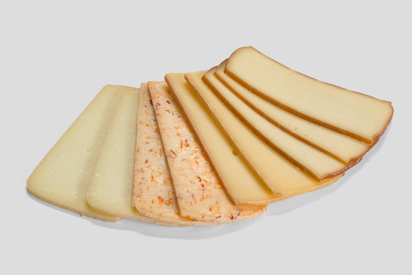Schweizer-Raclette-gemischt-in-Scheiben